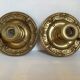 Pair of cave rat candlesticks with brass masks.