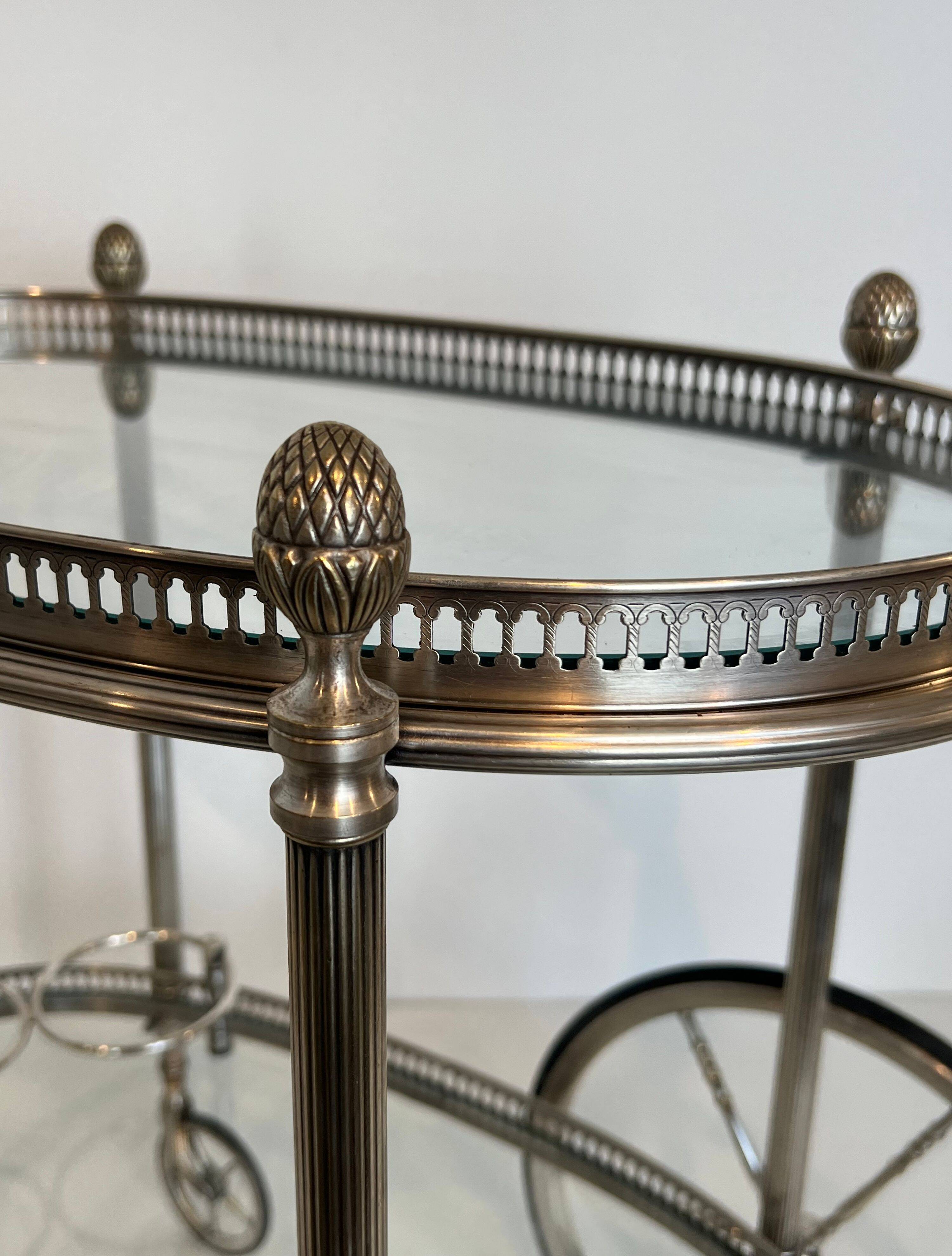 Oval silver-plated brass trolley from Maison Baguès.