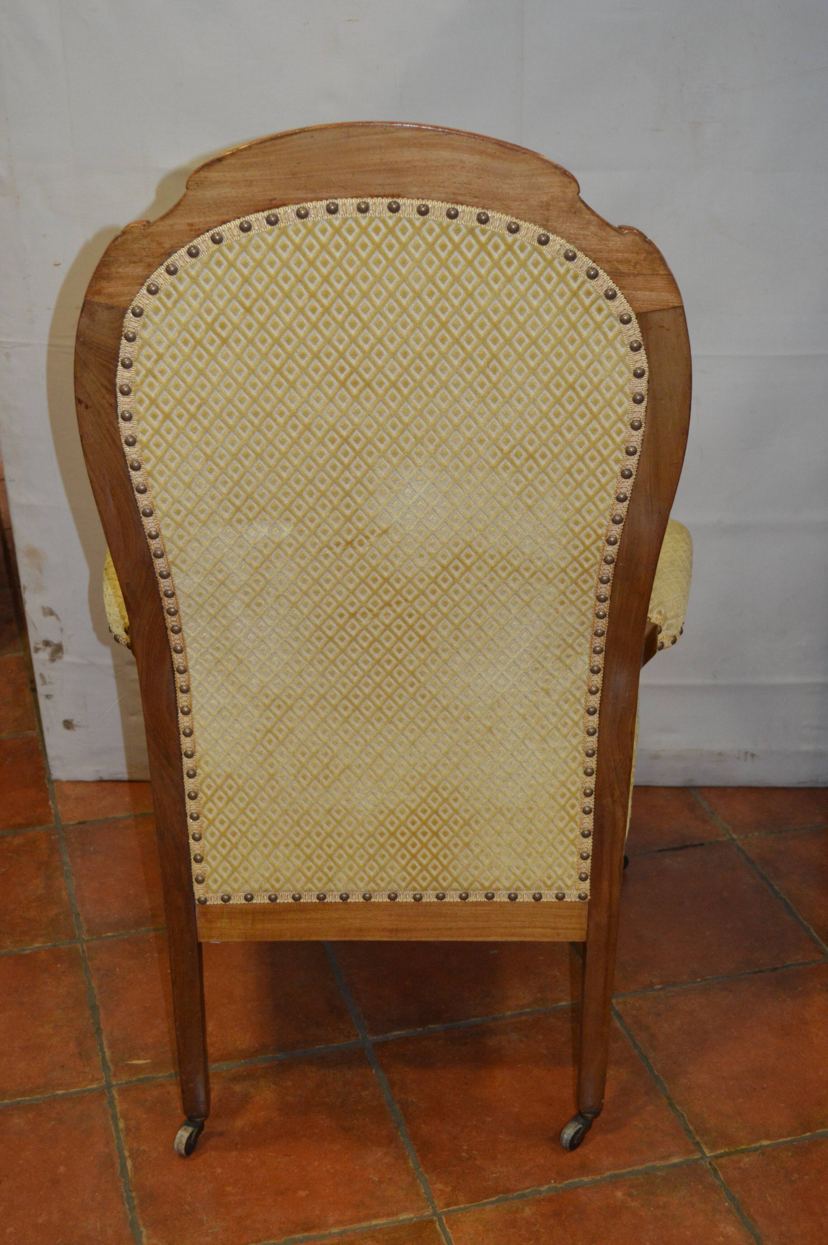 Walnut voltaire armchair