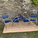 Set of 6 blue chairs with design curves