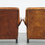 Set of 2  vintage cognac-colored sheep leather armchairs