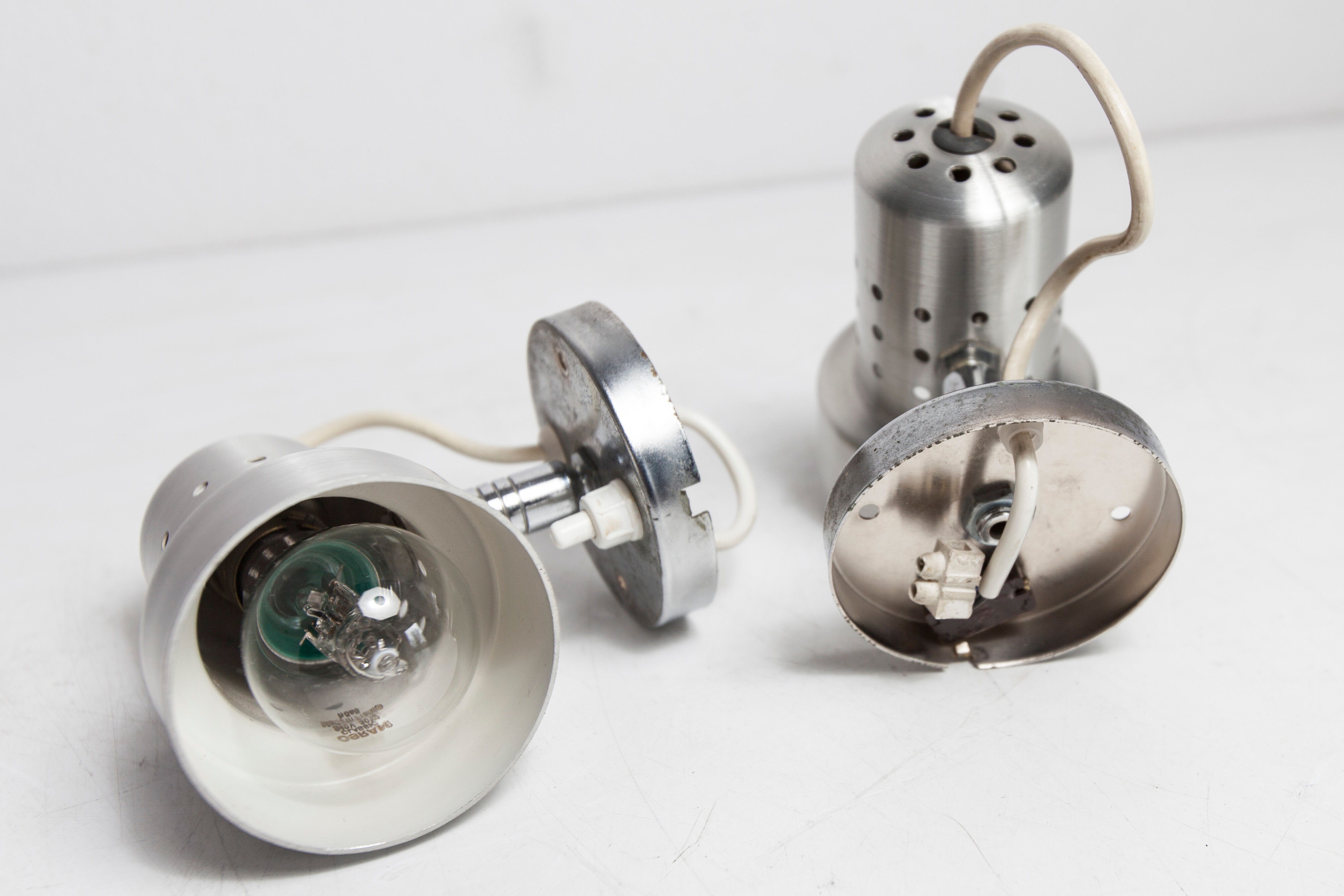 Pair of modernist wall lights in aluminum 1970