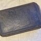 Cake tin from the early 20th century with embossed designs
