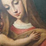 Old oil painting on canvas "Virgin Mary with Child"