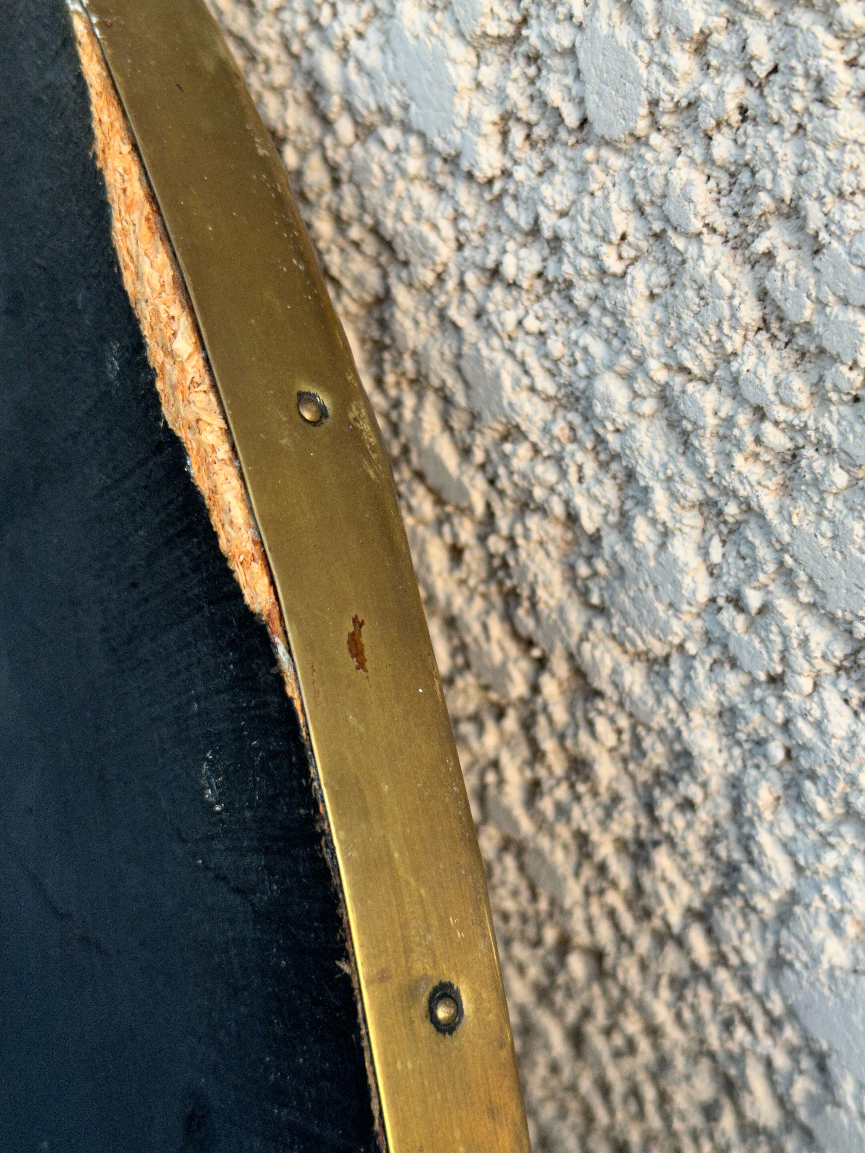 Round mirror in worked copper, Italy 1950