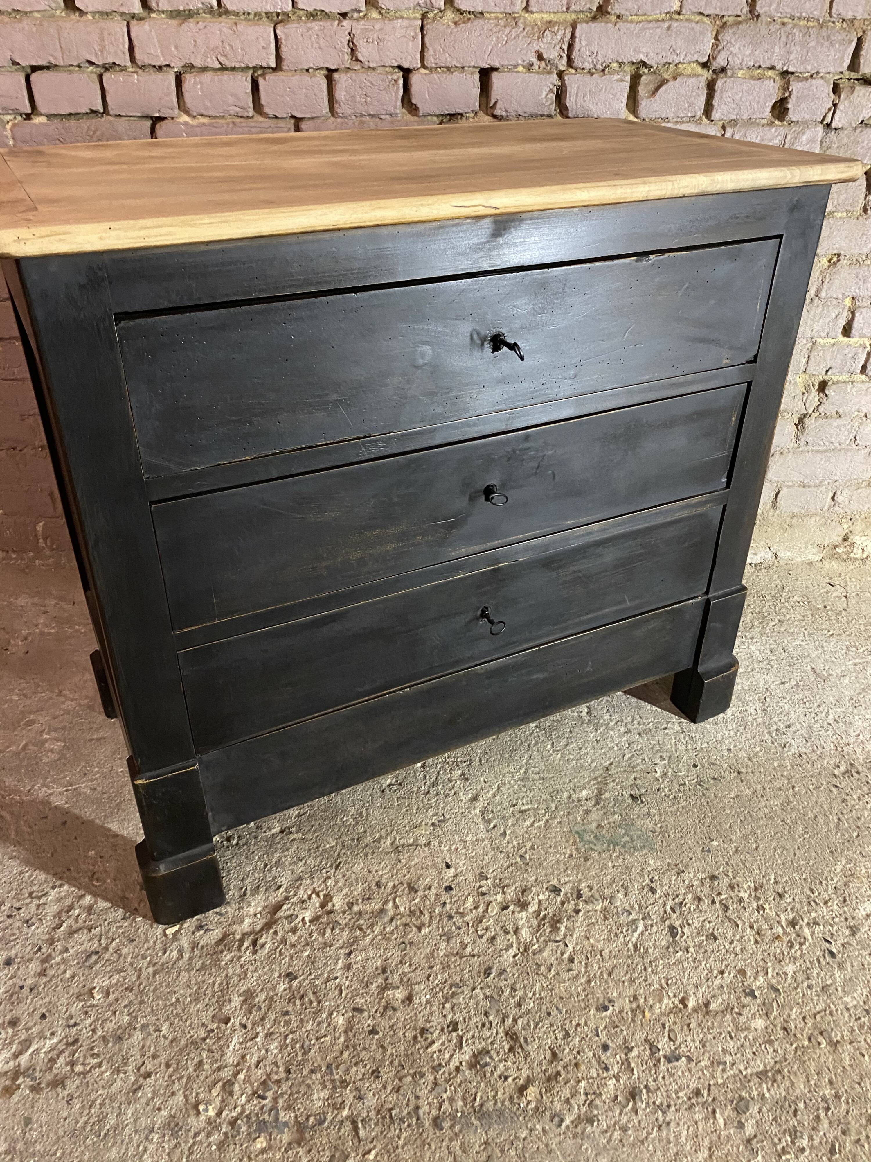 Old black patinated chest of drawers