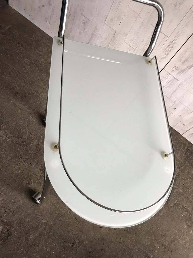 Chrome and transparent glass rolling dessert trolley, French Regency style from the 1960s.