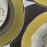 Set of 9 large vintage yellow deep plates with pink flowers and a gold rim.