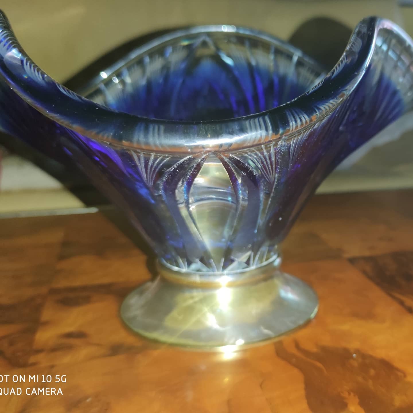 Two-tone crystal fruit bowl with wheel-work design on a silver-plated metal base, circa 1930