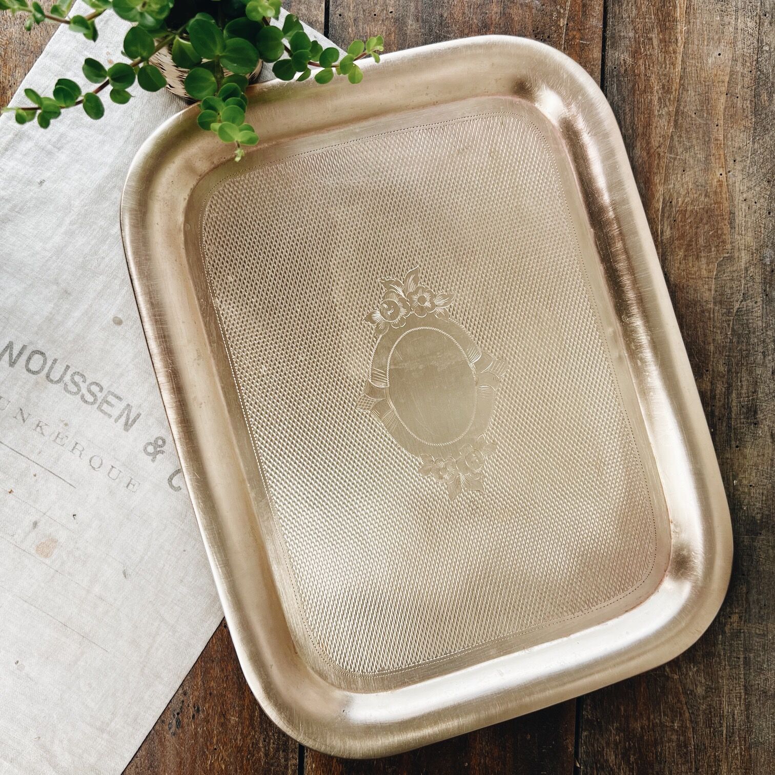 Golden and chiseled brass serving tray