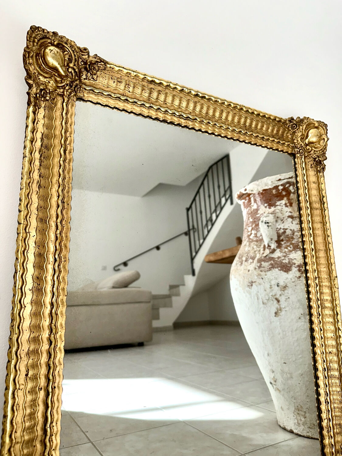 Mirror from the Restoration period, antique gilded, 19th century.