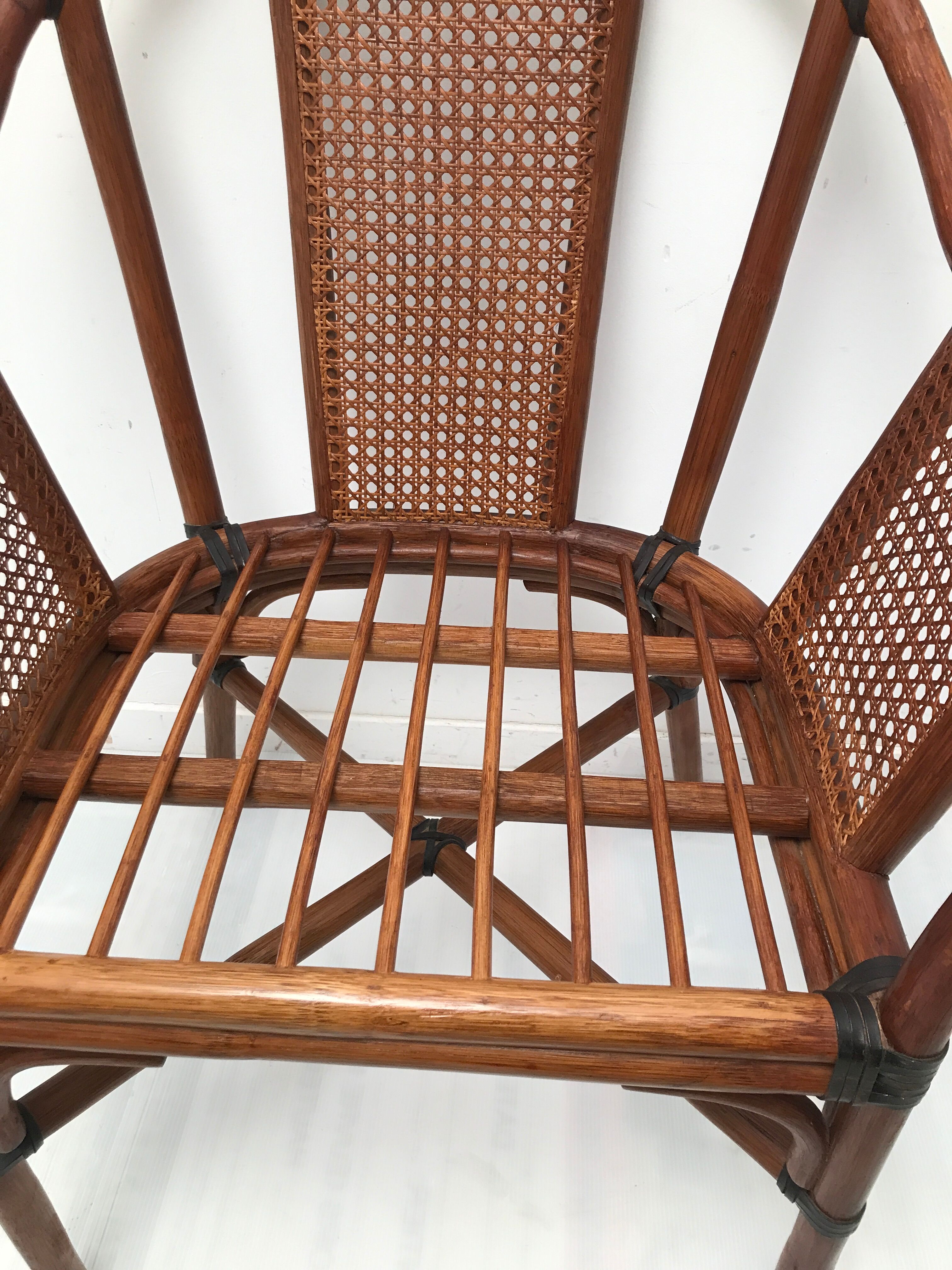 Rattan armchair with its footrest 70s