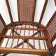 Rattan armchair with its footrest 70s