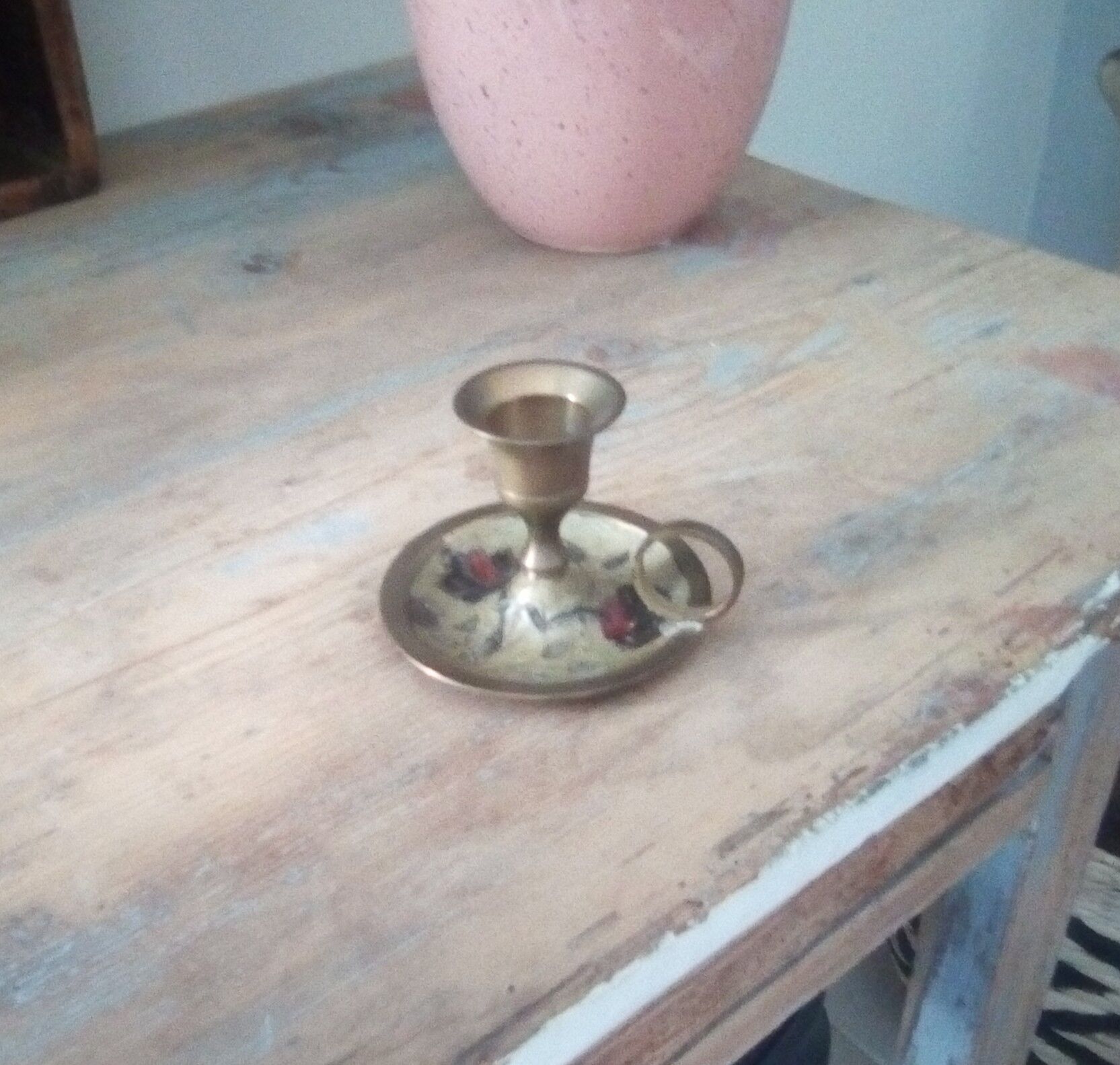 Vintage candlestick in brass cellar rat