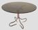Table basse italienne du milieu du siècle en chrome et acier avec plateau rond en verre fumé, années 1960