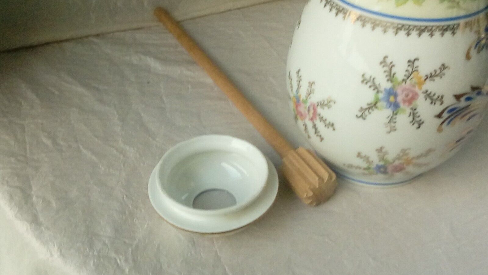 Limoges porcelain chocolatiere with its moussoir