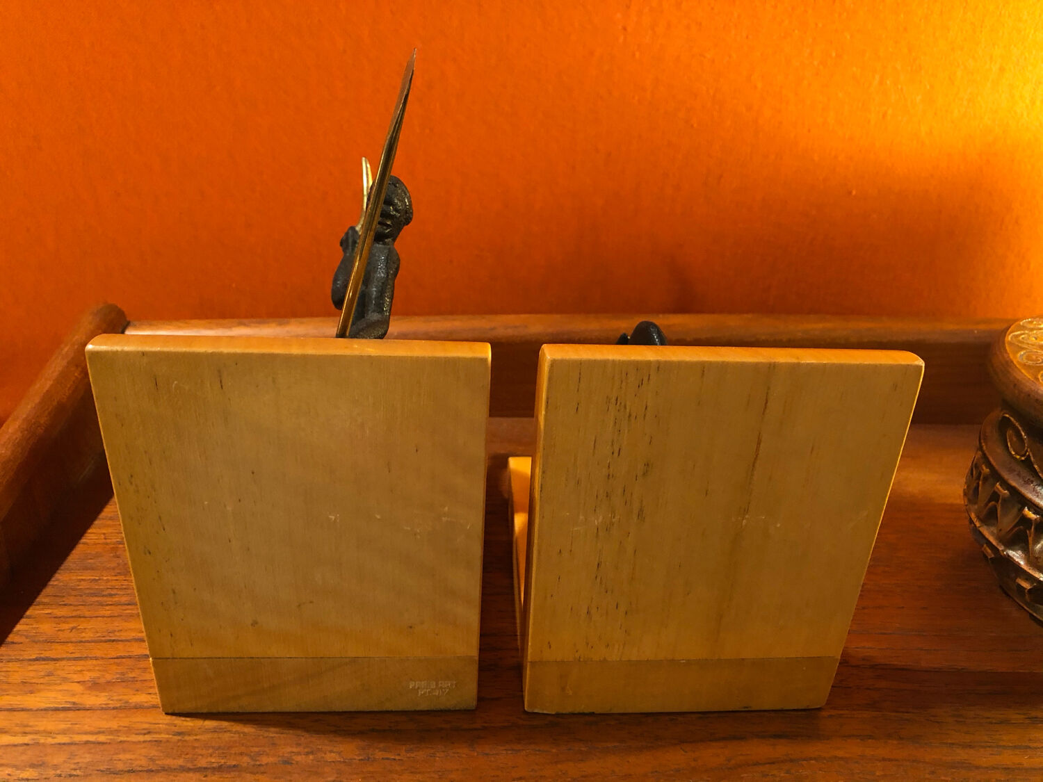 Art Deco bronze and sycamore bookends pair