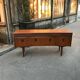 Curved teak enfilade from the 1960s in London.