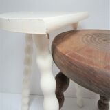 Two vintage tripod solid wood stools