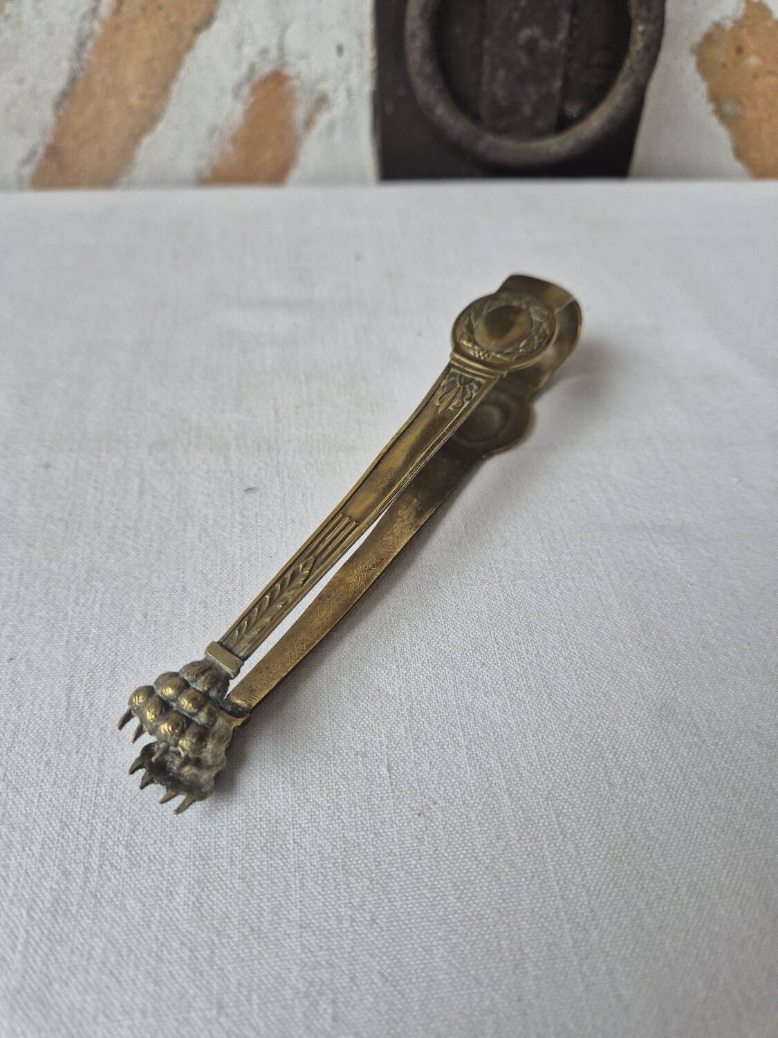 Antique brass sugar tongs