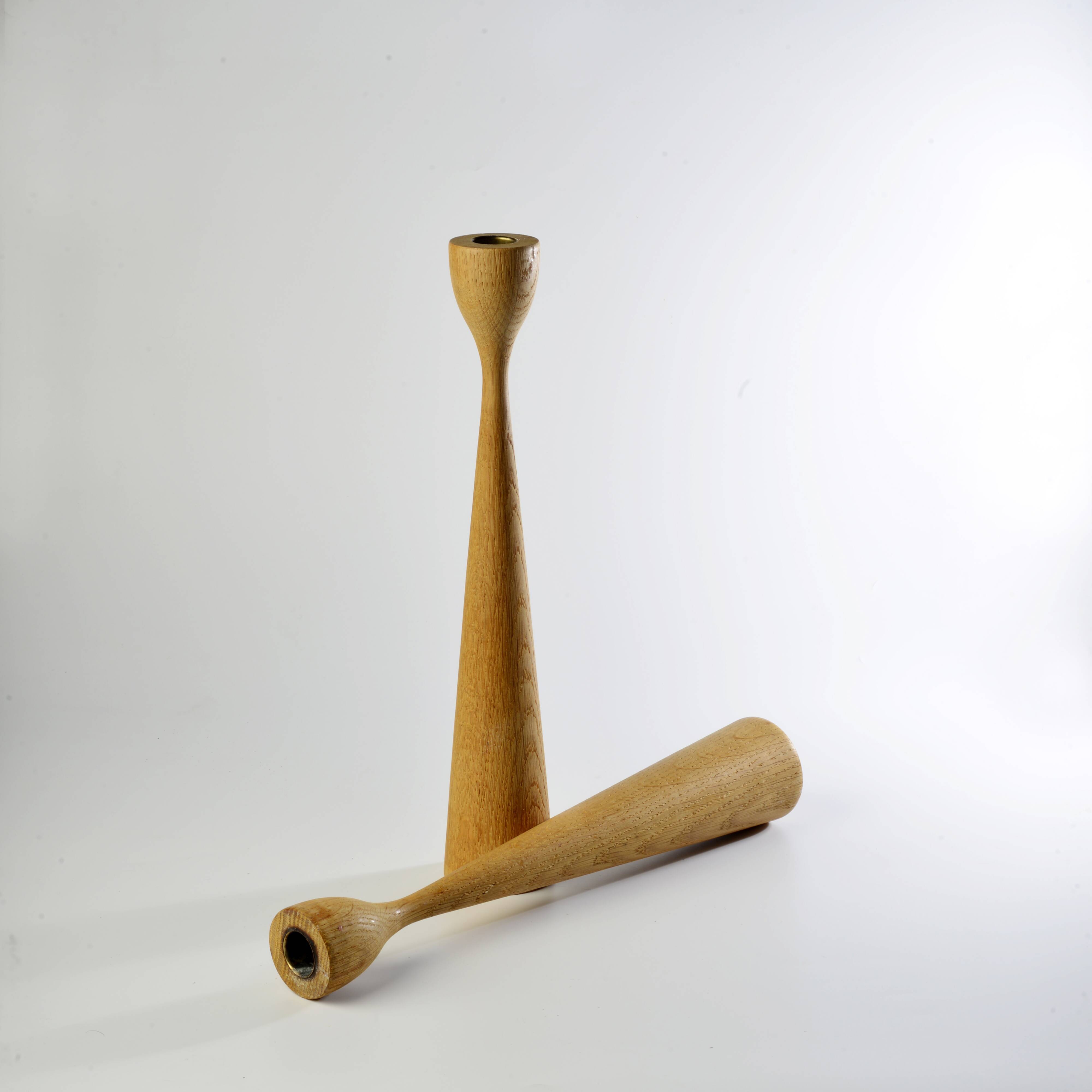 Pair of teak candle holders