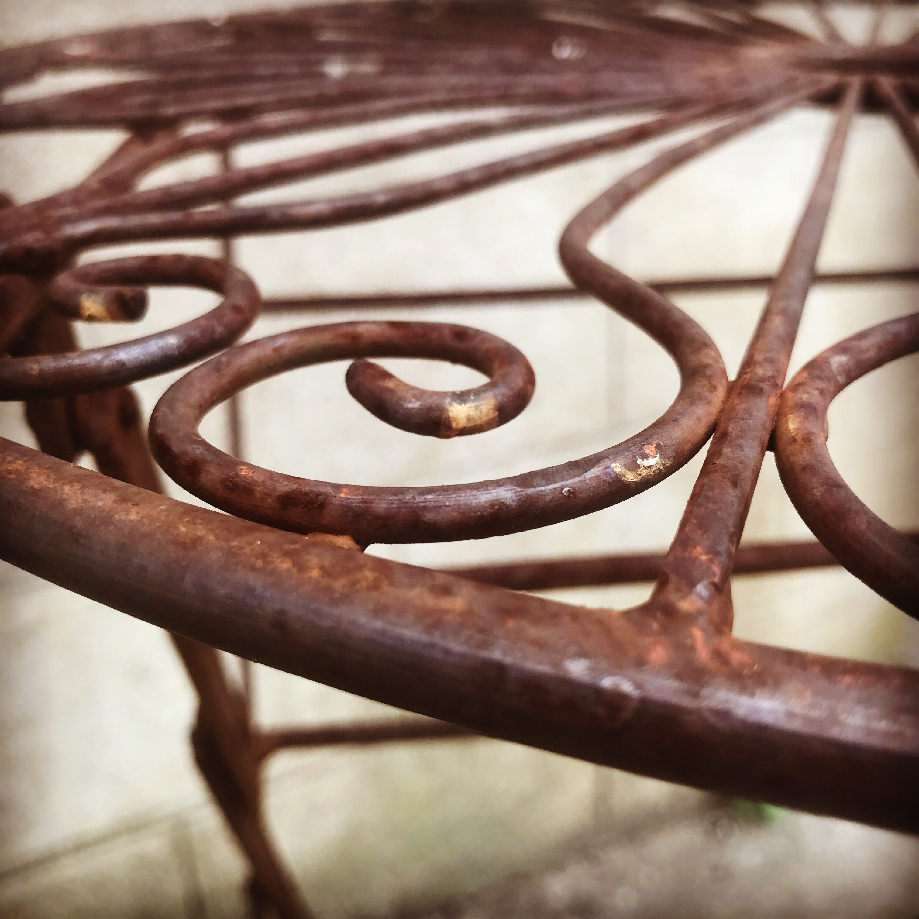 Ancient wrought iron pedestal table