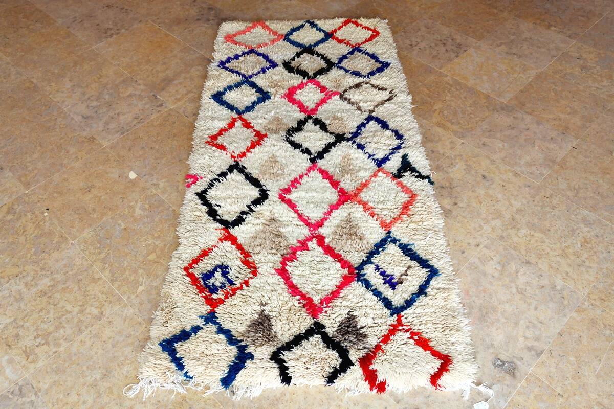 Small vintage beni ouarain rug