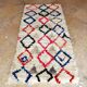 Small vintage beni ouarain rug