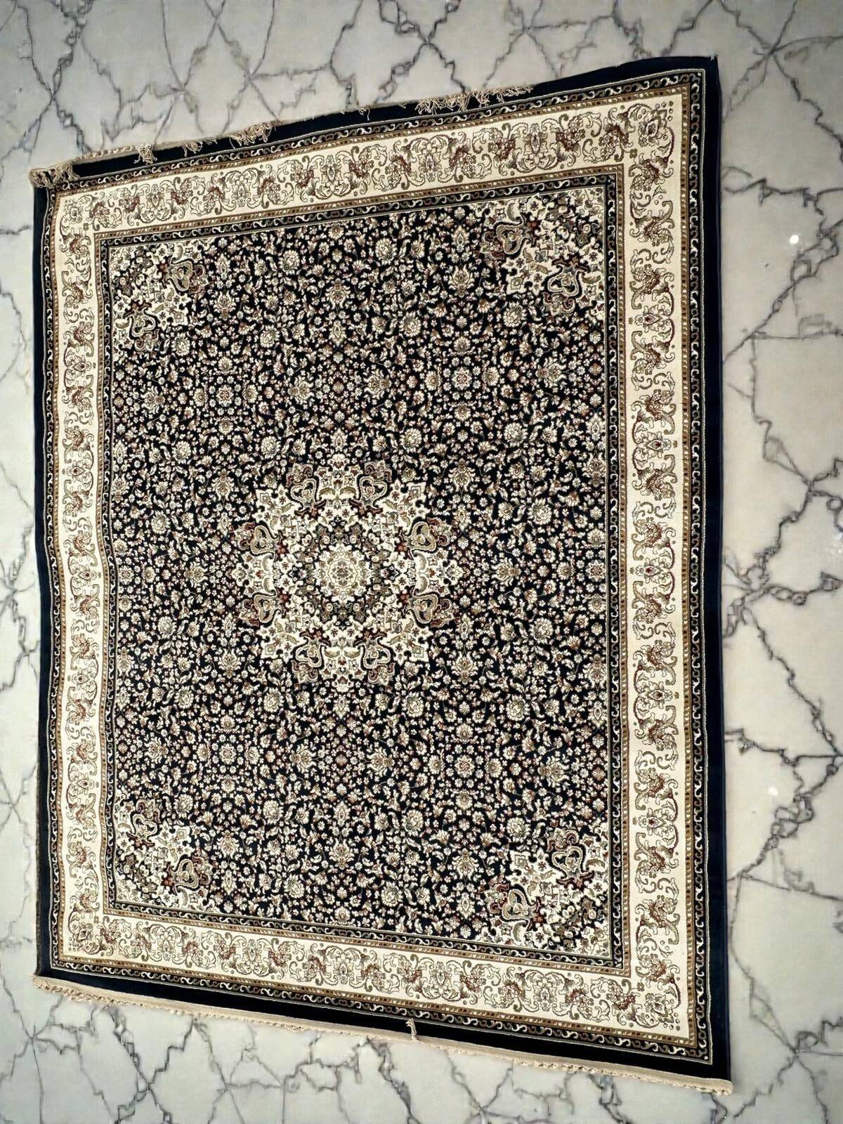 Classic navy blue living room rug decorated with flowers