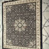 Classic navy blue living room rug decorated with flowers