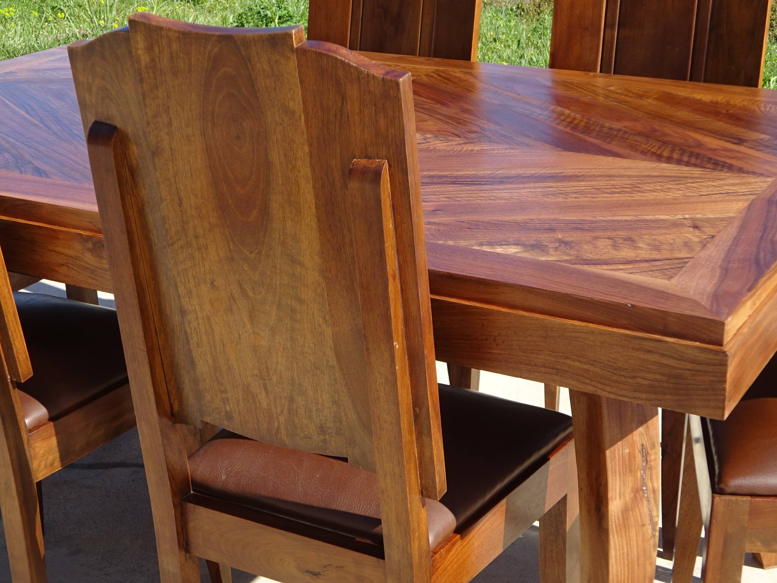 Antique solid walnut table with marquetry and extensions.