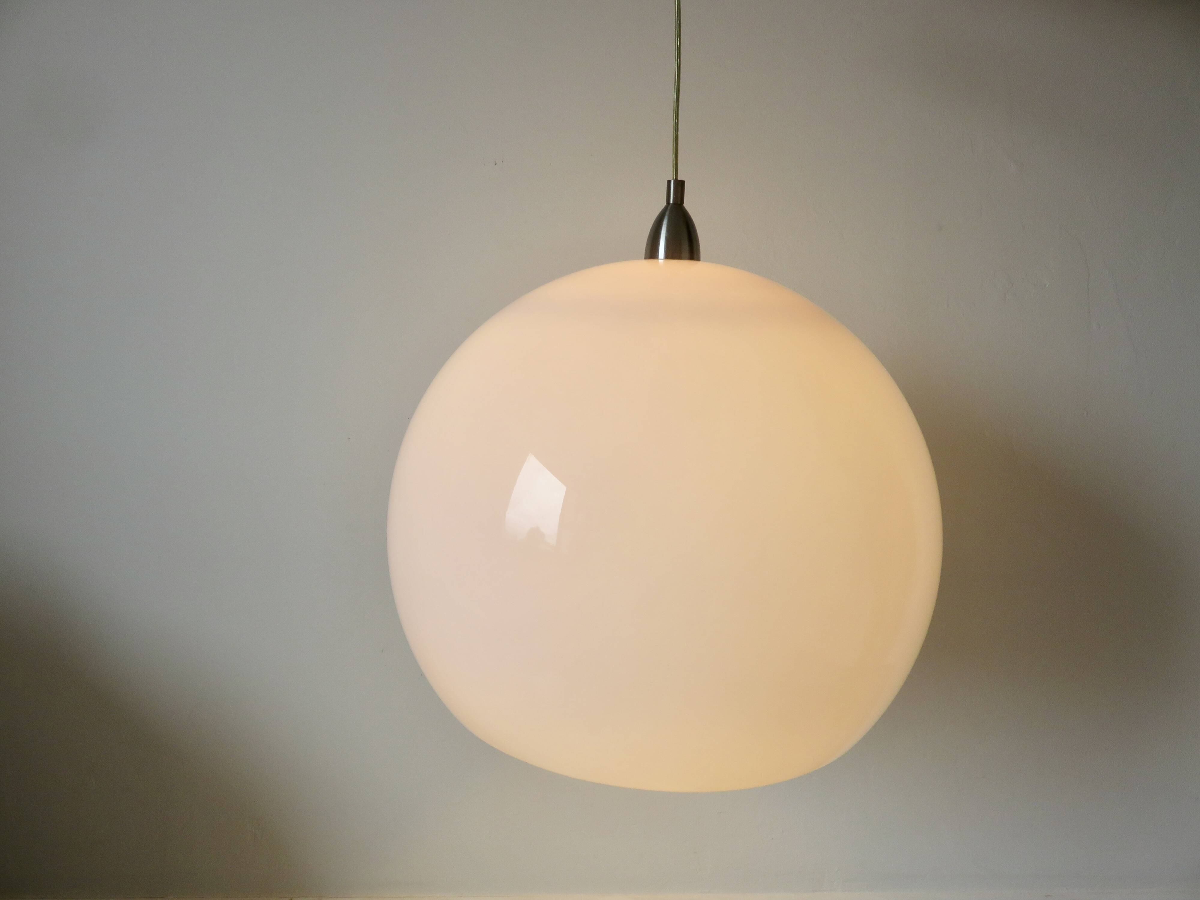 Large spherical suspension in perspex from the 1990s.