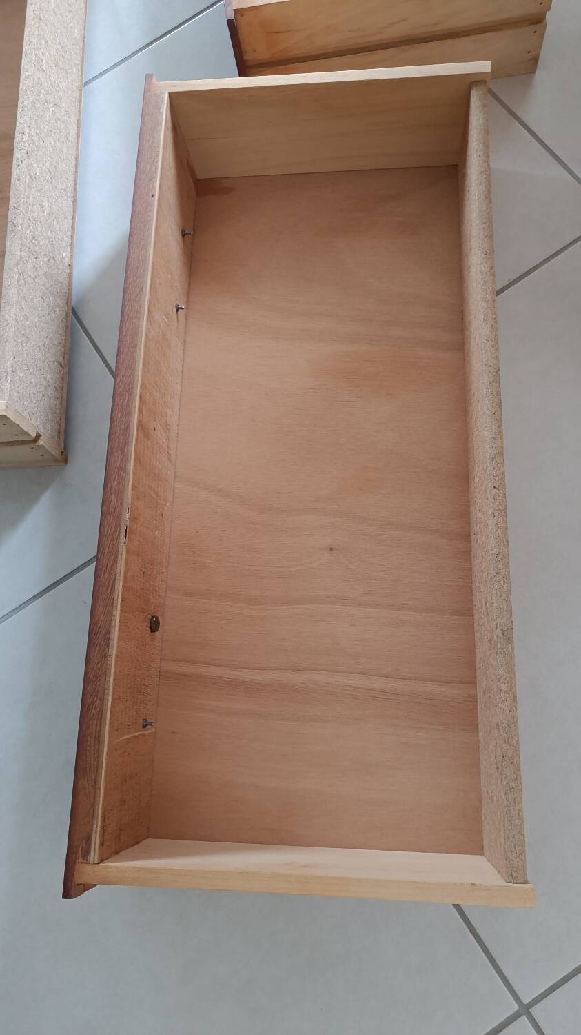 Rattan and wood splayed-leg chest of drawers