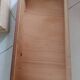 Rattan and wood splayed-leg chest of drawers