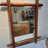 Vintage wooden mirror imitating bamboo
