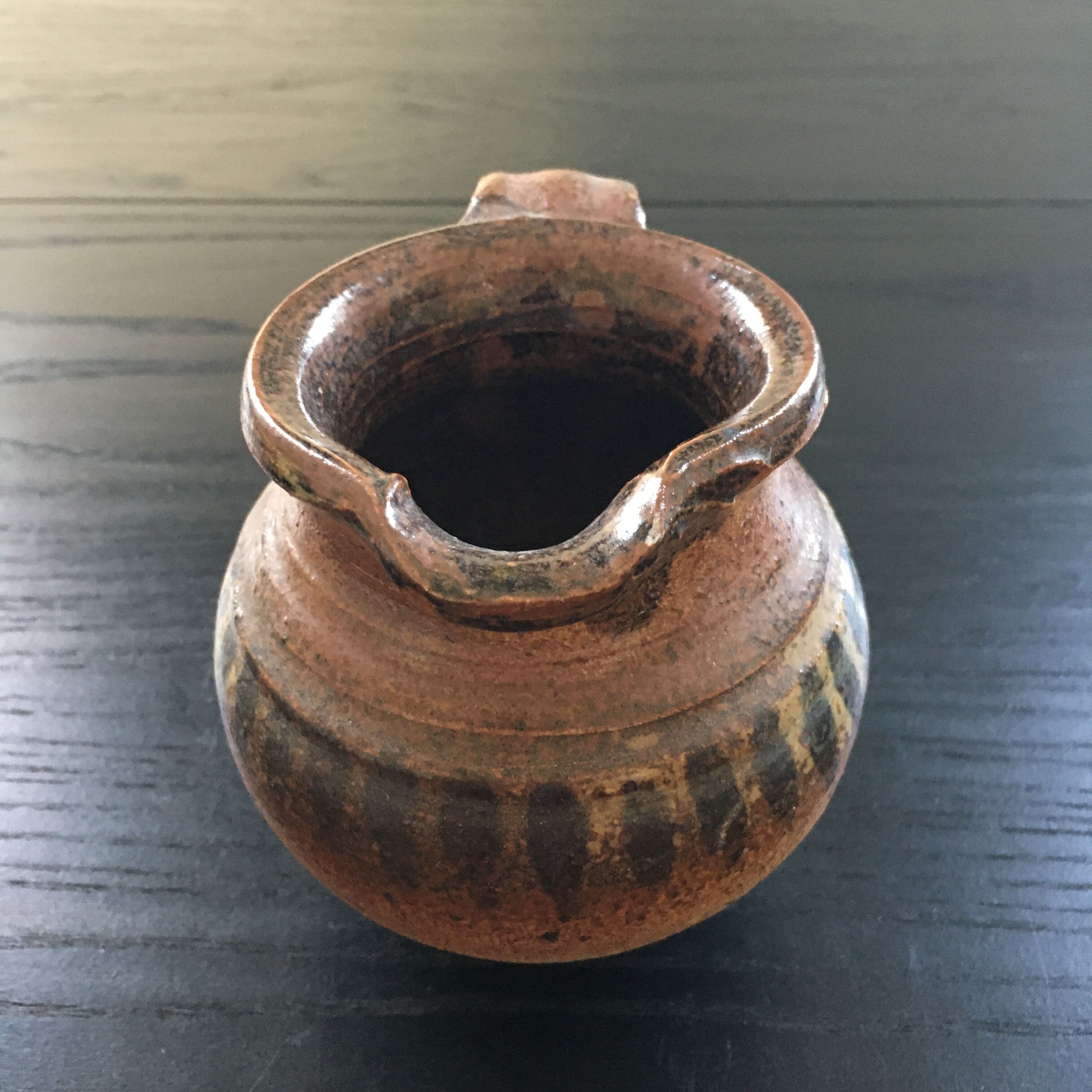 Stoneware pitcher with striped decoration