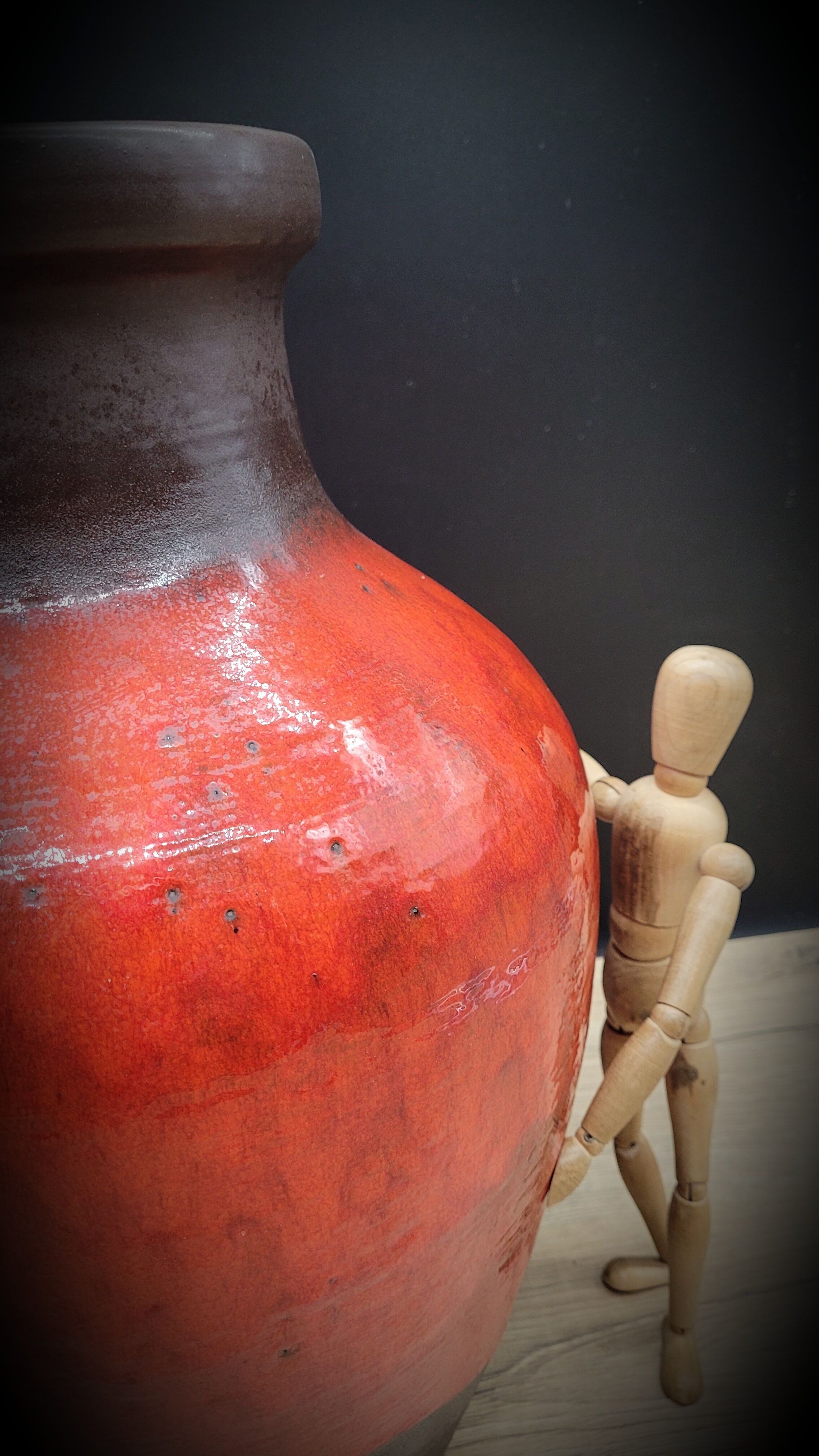 Red ceramic vase