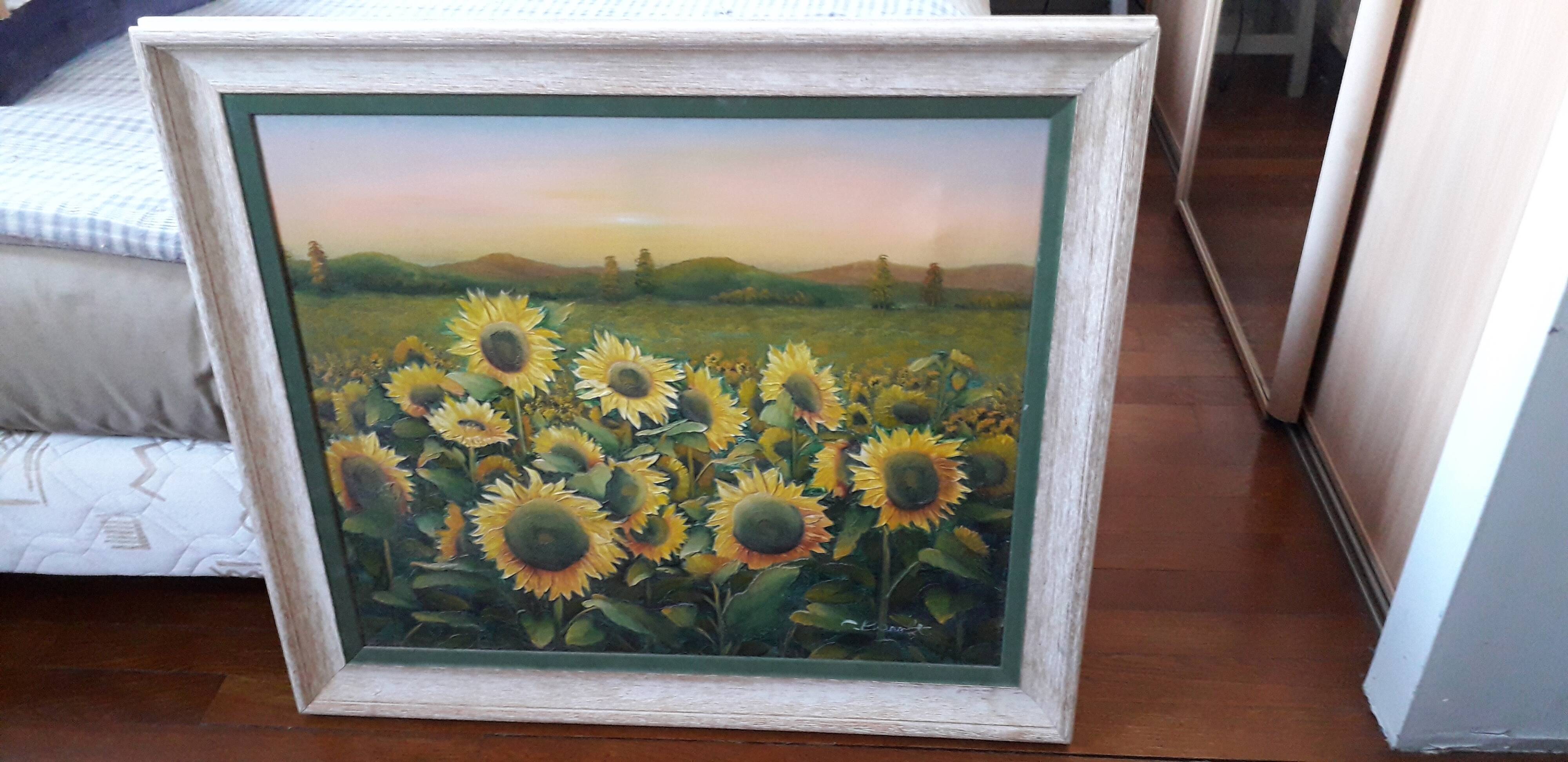 Old oil painting depicting a landscape of sunflowers