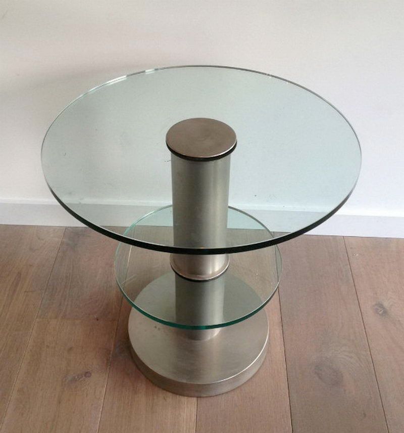 Brushed metal pedestal table and glass slabs