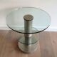Brushed metal pedestal table and glass slabs