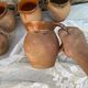 set of terracotta jugs country style
