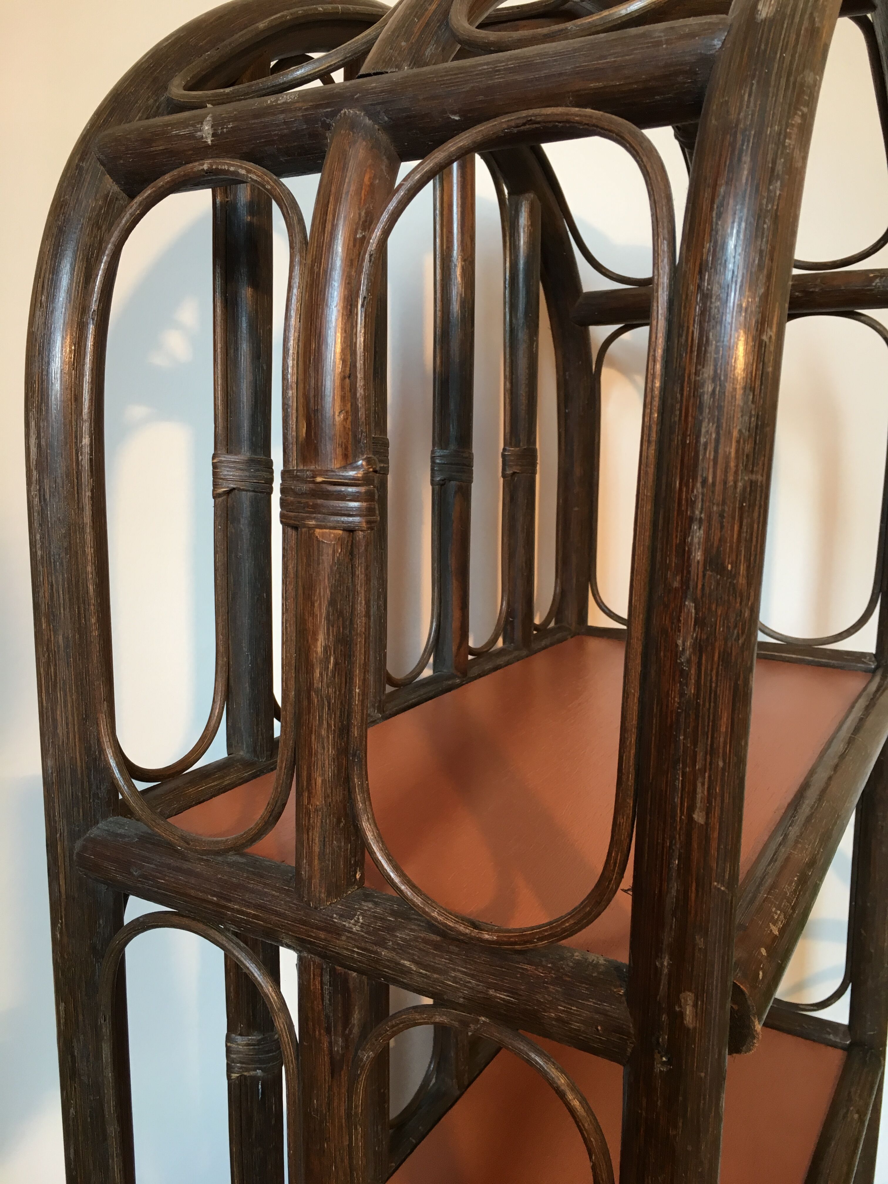 Vintage rattan library and terracotta-coloured tablets