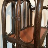 Vintage rattan library and terracotta-coloured tablets