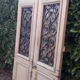 Porte d'entrée cintrée double en chêne, grilles et verre, XIXème