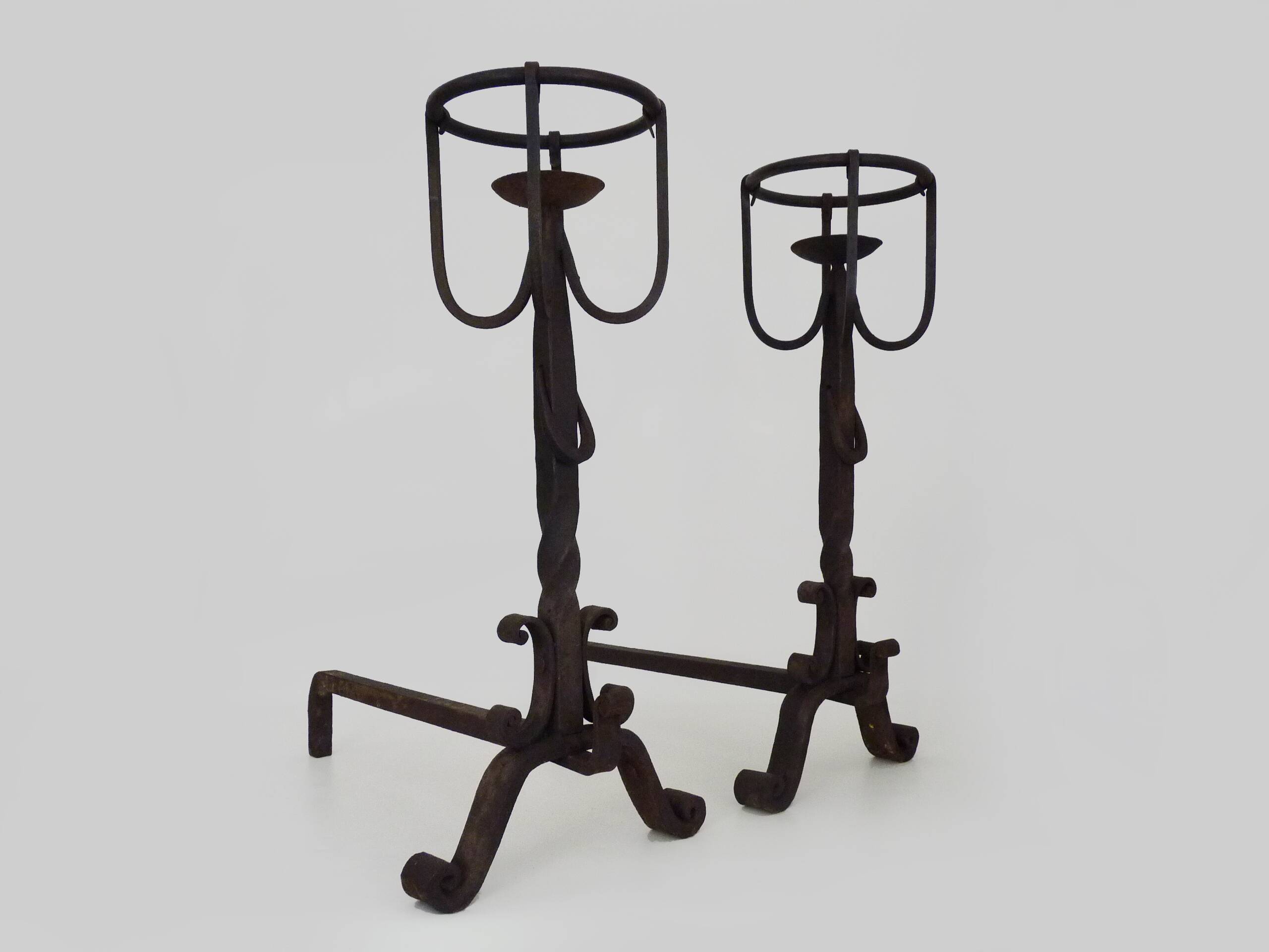 Pair of wrought iron andirons with 19th century fireplace set