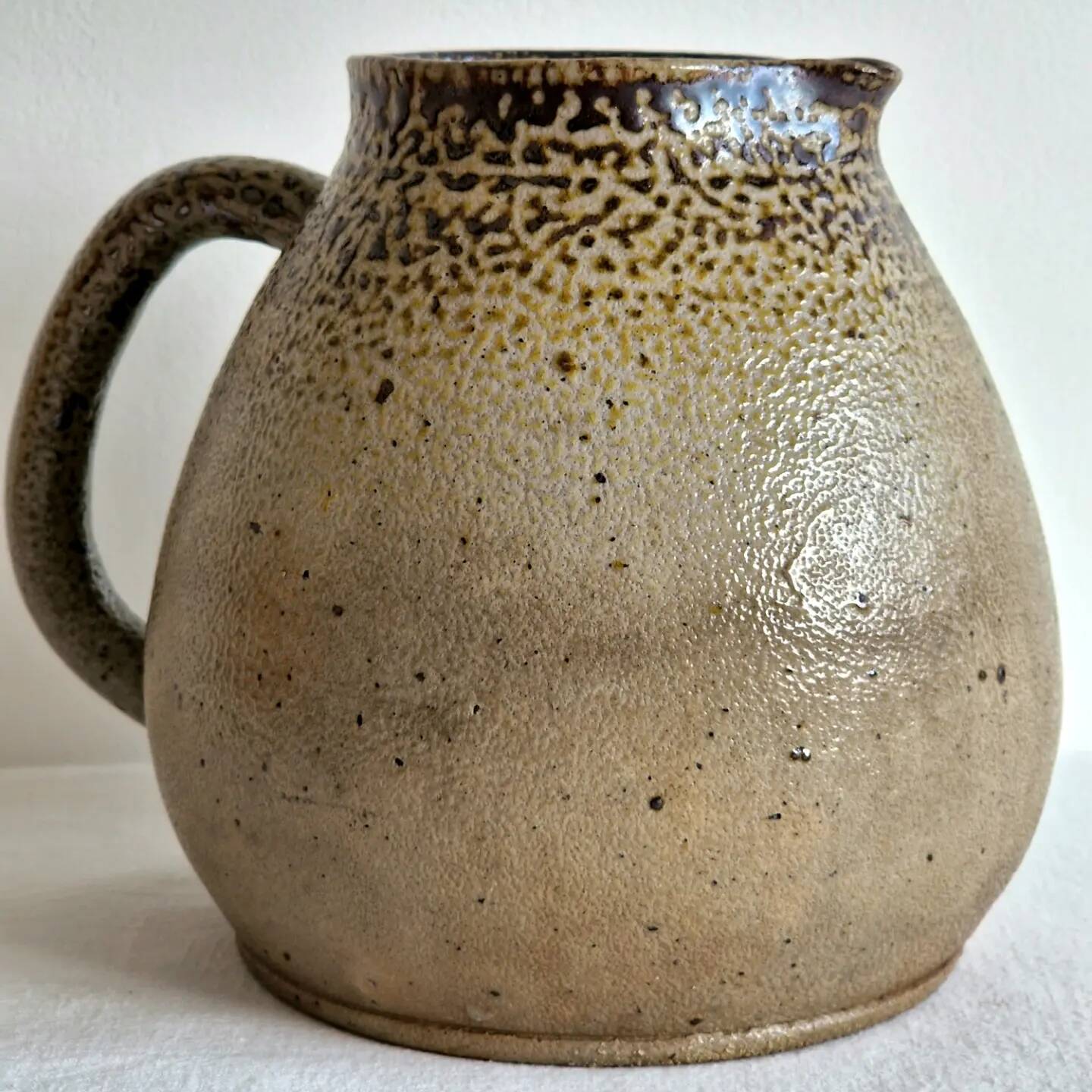 Impressive glazed stoneware pitcher