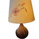 Important wooden floor lamp with a lampshade decorated with flowers from around 1970.