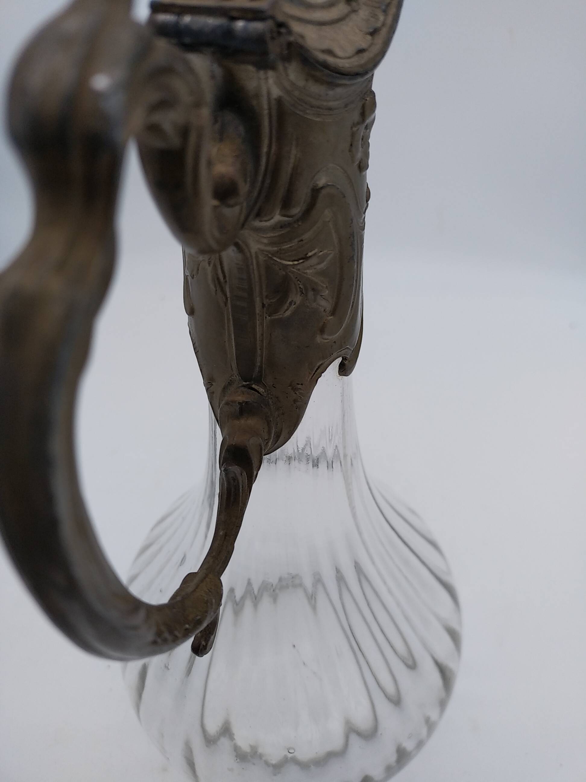 Large balloon glass carafe with pewter frame.