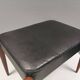 Footstool with teak wood legs and black skai (imitation leather) 1970s