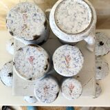 Spice jars and coffee maker in enameled sheet metal